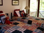 bedroom, lots of red, white, and blue