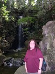 Cynthia in front of waterfall at Naritasan Shinshoji Temple