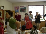 June Sakamoto in a bunny apron