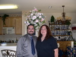 Ben and Cynthia and the huge flower arrangement