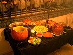 the spread (barbeque weenies, punch in a pumpkin, chips and salsa, apples, pumpkin pie, candy, chocolate-chip pumpkin muffins, cheese sausage and crackers, dinner-in-a-pumpkin, and cookie cake